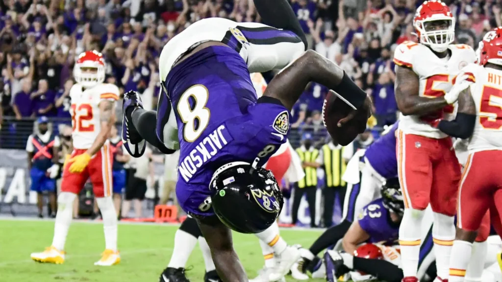 Lamar Jackson flipping into the Endzone